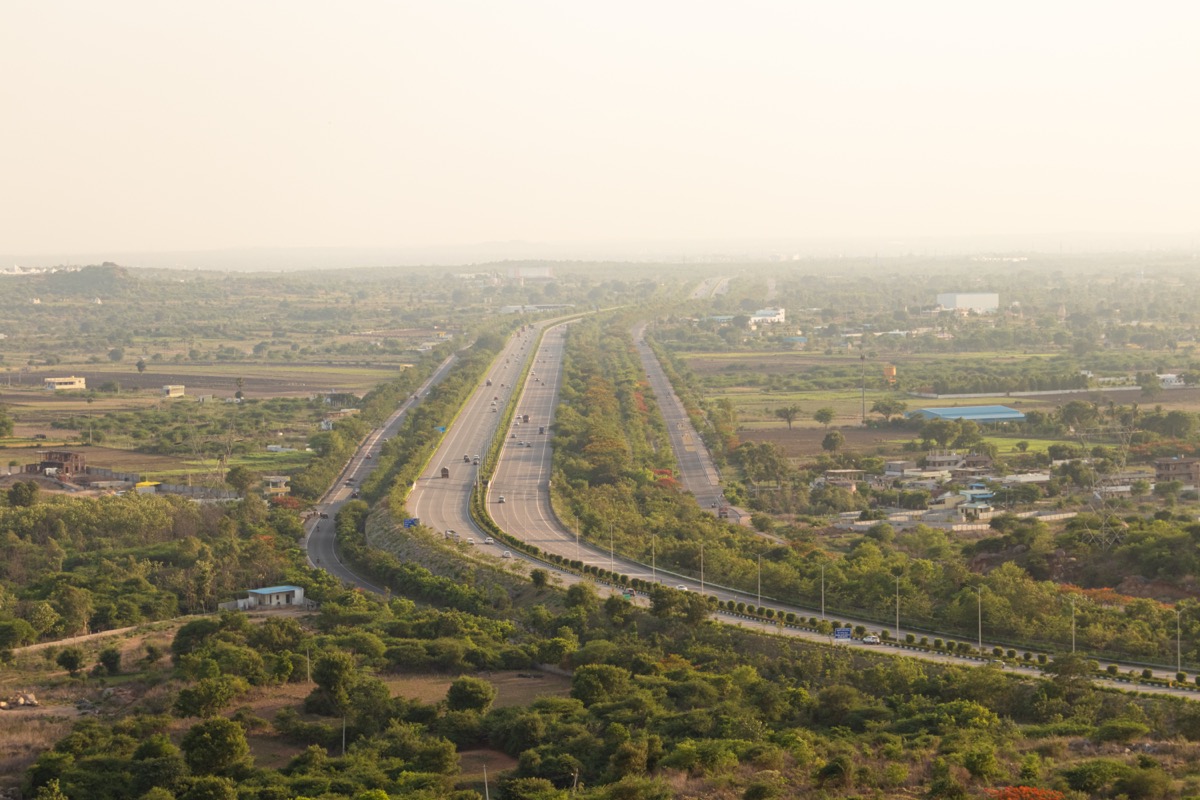 Multi-lane urban highway — local taxi trips within Vijayawada